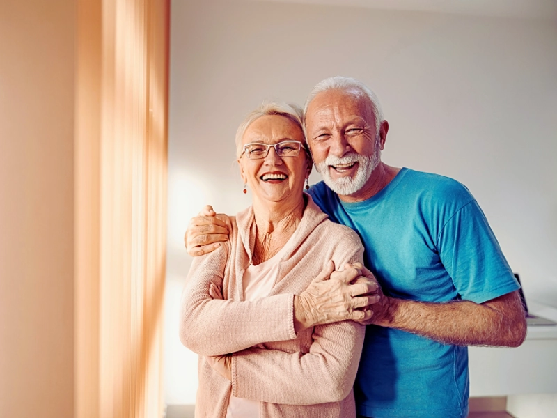 Elderly couple smiling