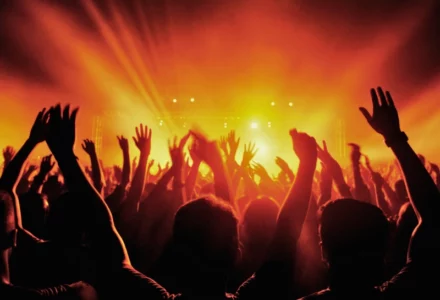 People black silhouettes music concert. Injured at a concert
