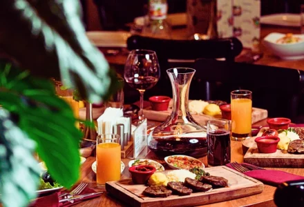Food and wine on the table in a restaurant. Injured at a Naperville Restaurant