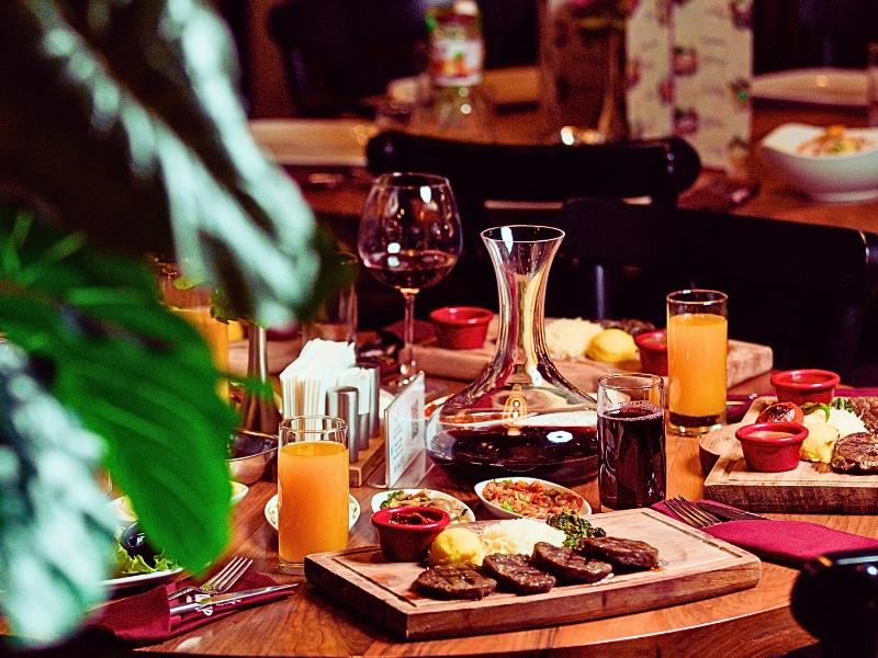 Food and wine on the table in a restaurant. Injured at a Naperville Restaurant