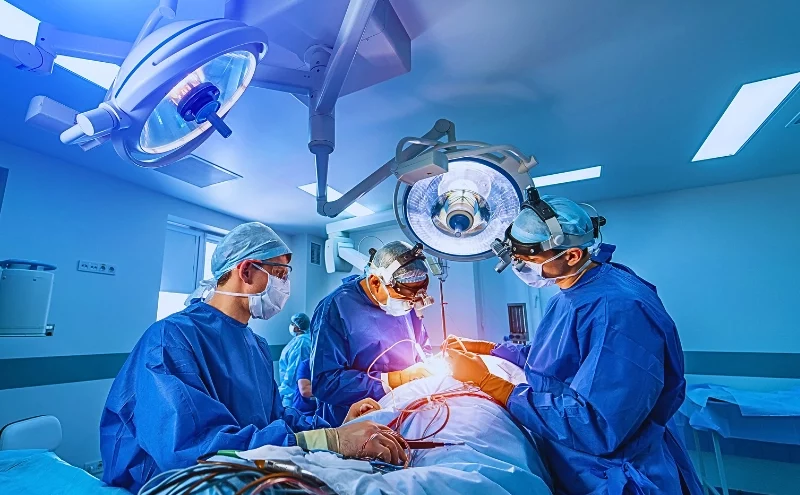 Central Illinois Hospital Safety Ratings Highlight Risks of Medical Malpractice 1 Neurourgeons are operating with medical robotic surgery machine.
