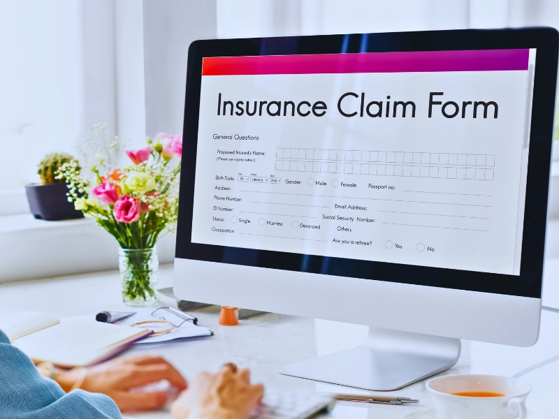 Insurance Claim Form Document Application Concept. Hidden Costs of a Car Accident