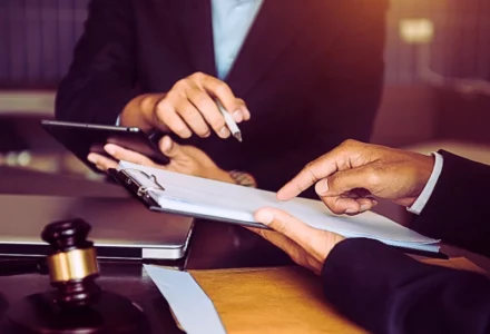 Client consulting a lawyer. Need a Lawyer After a Clear-Fault Car Accident