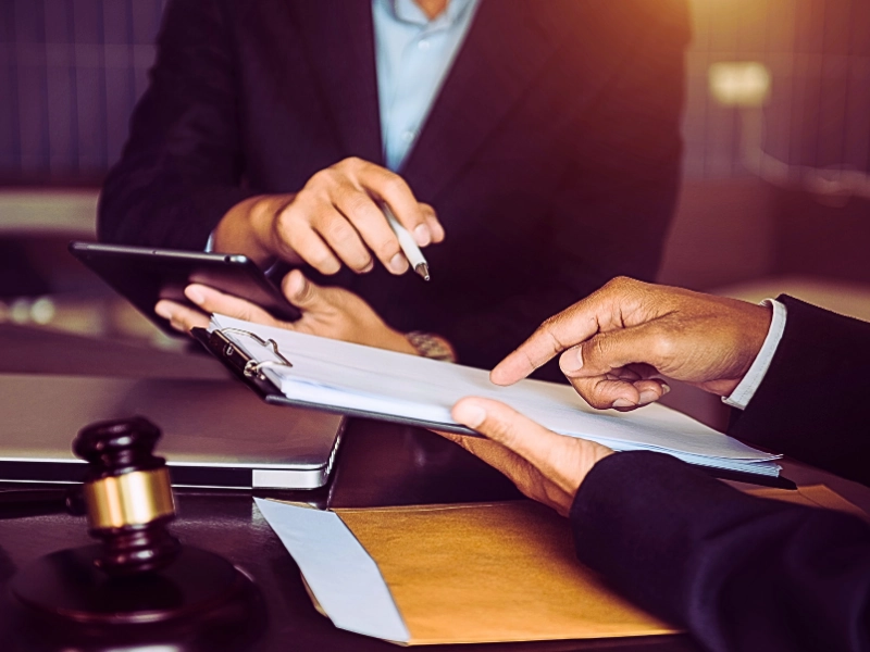 Client consulting a lawyer. Need a Lawyer After a Clear-Fault Car Accident