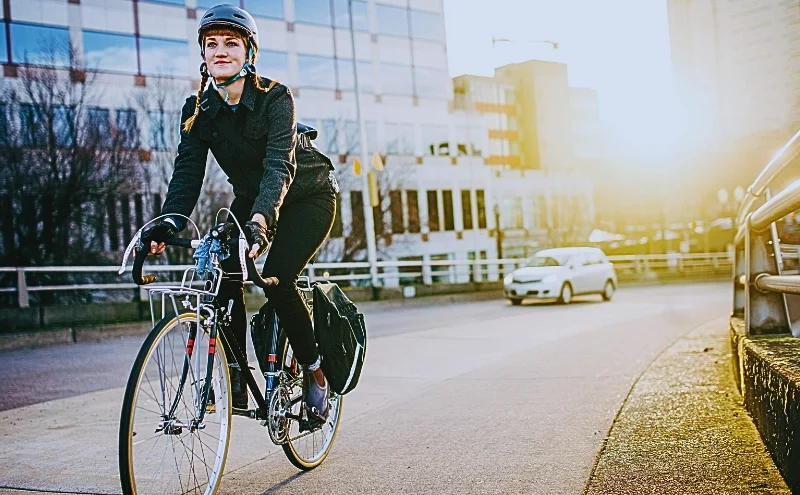Blocked Bike Lanes, Serious Injuries: Turning Obstruction into Liability 1 A person riding a bicycle on a city sidewalk. Blocked Bike Lanes