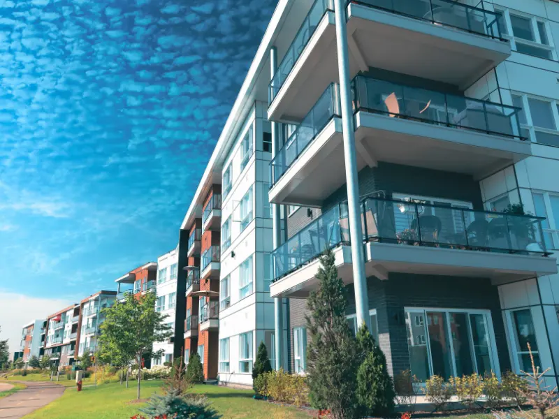 Modern apartment building with balconies under a blue sky. injury at an Illinois apartment complex