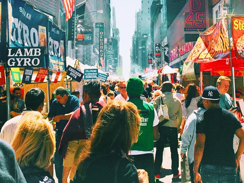 Crowded street market in the city with food vendors. after an accident at a Naperville festival